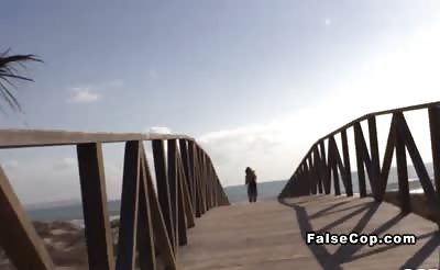 Fake cop gets deep throat on the beach