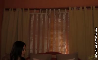 Stunning brunette plays with pussy