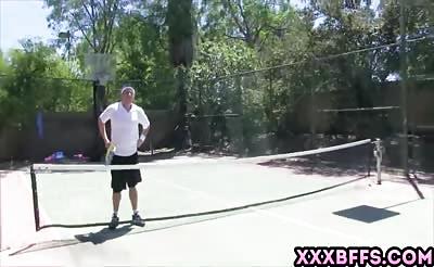 Teen redhead fucks with her tennis instructor outdoors