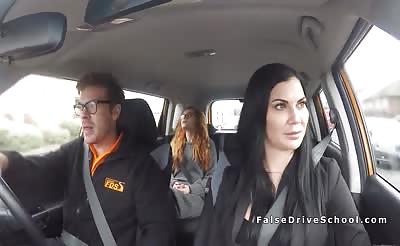 Redhead in threesome in fake driving school