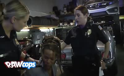 Two hot cops convince an ebony dude to fuck