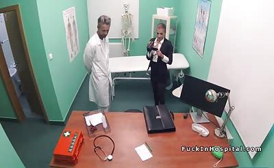 Doctor bangs real estate woman in office