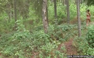 College couple in the wild woods